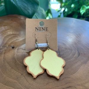 Genuine leather painted pastel yellow Moroccan shape earrings